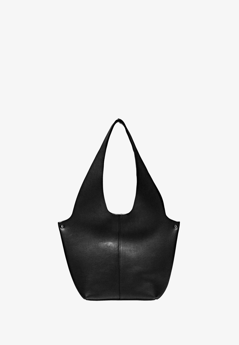 Black leather tote bag with a wide, curved handle and a smooth finish. Features a central seam and silver hardware accents.