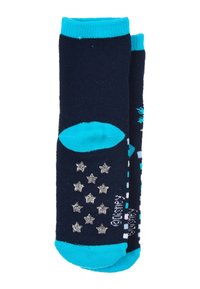 Calcetines marinos con puños y acentos turquesa, que presentan motivos de estrellas plateadas y patrones geométricos en una tela texturizada.
