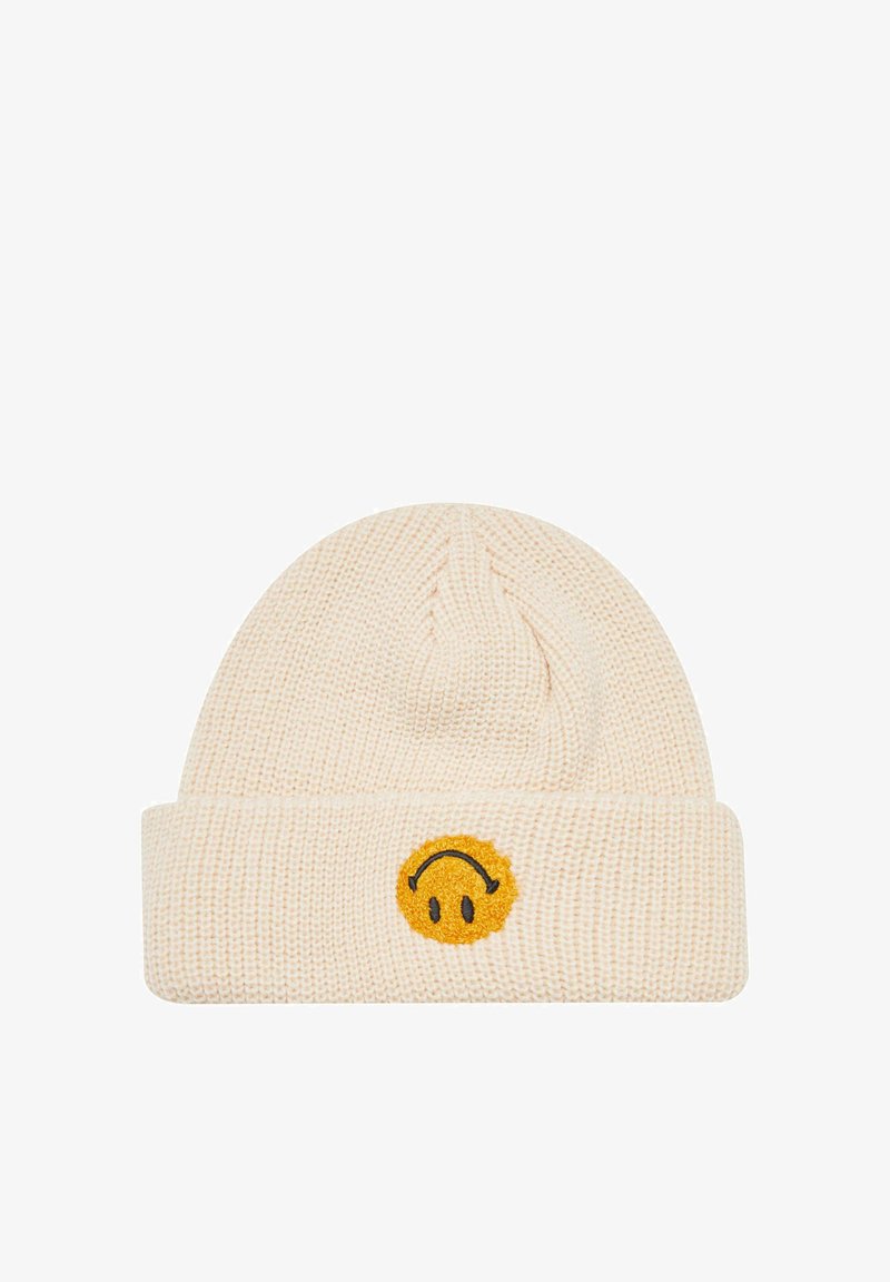 Berretto a maglia di colore crema morbido con risvolto. Caratterizzato da una toppa con faccina sorridente gialla e dettagli neri. Tessuto testurizzato e caldo.