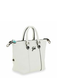 Sac à main en cuir blanc avec des accents et des coutures noires. Il dispose de deux anses courtes, d'une fermeture éclair et de boutons en turquoise et noir.