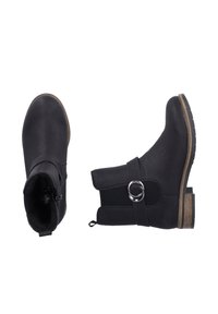 Bottines noires avec une finition texturée, dotées d'une fermeture éclair sur le côté, d'une sangle en cuir, d'un accent métallique circulaire et d'un petit talon en bois.