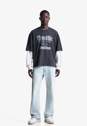 Flared Jeans - light blue