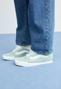 Unselected, gray olive