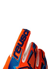 Bright orange and blue goalkeeper glove with textured grip and "reusch" brand name visible on the index finger.