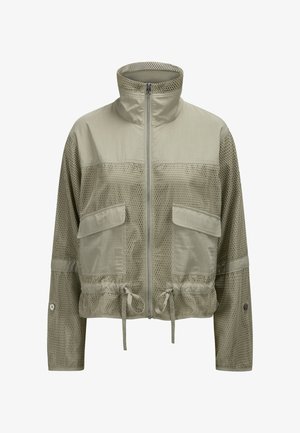 Hellbeige Netzjacke mit hohem Kragen, Frontreißverschluss, zwei Klappentaschen und verstellbaren Kordelzügen an der Taille.