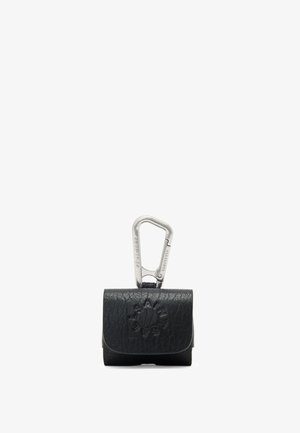 Black leather bag with a textured finish, featuring a silver carabiner clasp and embossed logo on the front. Square shape with rounded edges.