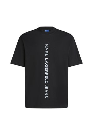 Svart bomulls-T-shirt med vertikal vit text som läser "KARL LAGERFELD JEANS." Klassisk rund hals och korta ärmar. Slät textur.