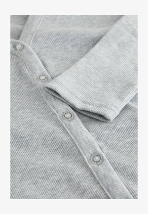 Gray ribbed cardigan with a button closure, featuring smooth buttons and a soft texture, highlighting a casual design.