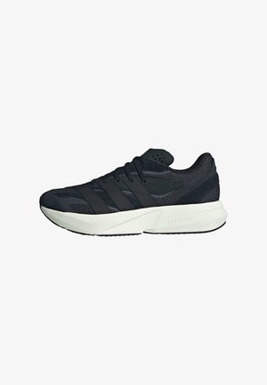 Black athletic shoe with mesh and synthetic upper, featuring three black stripes, a textured surface, and a white LIGHTSTRIKE midsole.