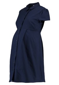 Těhotenské šaty tmavě modré barvy s krátkými nafouklými rukávy, zapínáním na knoflíky vpředu a volným střihem. Vyrobené z lehké bavlněné látky, která poskytuje pohodlí a volnost.