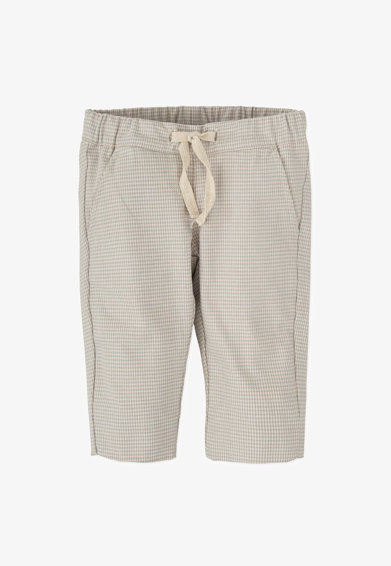 Pantalones cortos a cuadros beige con cintura elástica y cordón. Cuenta con bolsillos laterales y un corte relajado. La tela tiene una textura ligera.