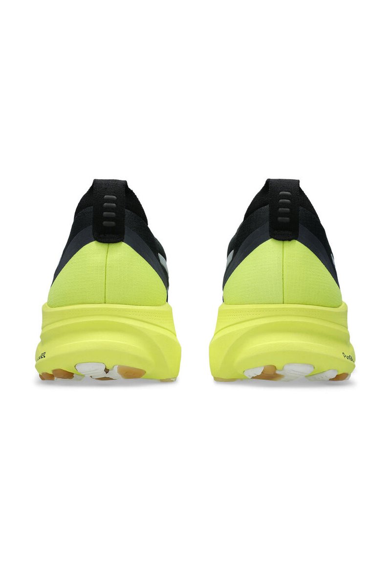 Black and neon yellow athletic shoes with a rounded sole, textured upper, and heel pull tabs, featuring bold contrasting color segments.