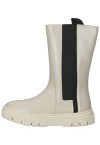Bottine en cuir beige avec un panneau élastique noir. Caractéristiques d'une semelle en caoutchouc épaisse avec une texture antidérapante. Fini lisse et design élégant.