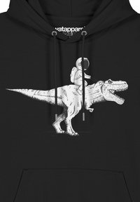 Zwarte hoodie met witte graphic van een dinosaurus en astronaut. Het ontwerp omvat gedetailleerde lijntekeningen die de kenmerkende eigenschappen van de dinosaurus laten zien.