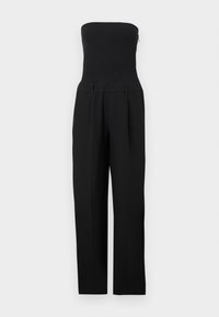 Μαύρη ολόσωμη φόρμα χωρίς τιράντες με εφαρμοστή μπούστα και παντελόνια φαρδιάς πατούρας, σε λευκό φόντο.