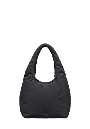 Sac fourre-tout noir matelassé avec poignées arrondies et logo subtil en relief à l'avant, design minimaliste et moderne.