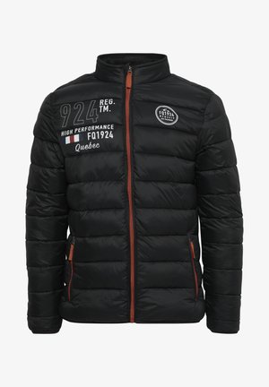 Black puffer jacket with a high neck and orange zipper. Features patches with text and patterns on the left chest and sleeves. Adjustable fit.