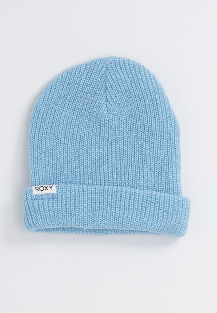 Bonnet en tricot bleu clair avec une texture côtelée et un revers. Présente une petite étiquette blanche avec "ROXY" positionnée sur le revers.