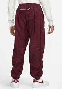 Nike Sportswear Pantaloni sportivi - dark beetroot coconut milk