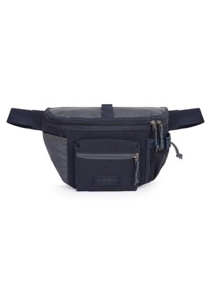 Sac banane Eastpak bleu marine avec une poche zippée à l'avant, une poche en mesh latérale, une fermeture éclair supérieure et une sangle réglable sur fond blanc.
