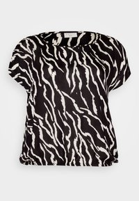 Top nero e bianco dalla vestibilità ampia con un motivo a strisce zebrate ondulate, maniche corte e scollo rotondo realizzato in un tessuto leggero.
