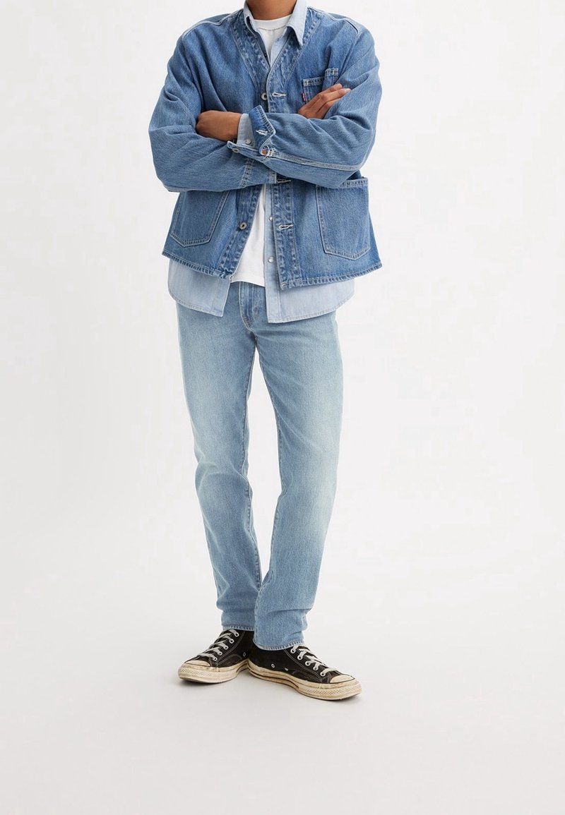 Levi's® Jeans Tapered Fit blue denim (Pre-owned) Zalando