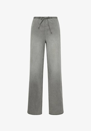 Szare spodnie o szerokich nogawkach, z elastycznym pasem i zapięciem na sznurek, wykonane z miękkiego, teksturowanego materiału.