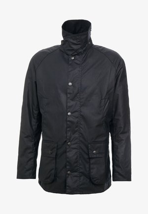 Veste noire avec un col montant, des boutons-pression et deux poches devant. Fabriquée dans un tissu lisse et durable, avec un motif légèrement texturé.