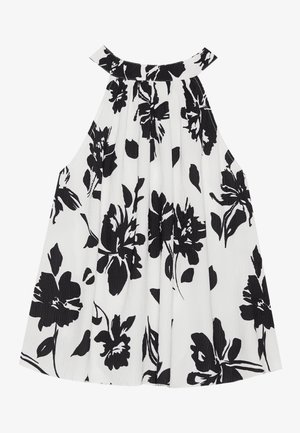 Haut sans manches noir et blanc à motif floral avec une texture plissée, un col rond et un imprimé floral audacieux mettant en avant de grandes fleurs sombres.