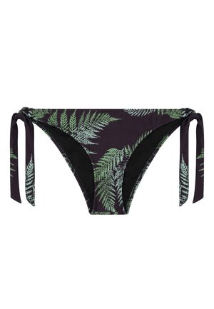 Schwarze Bikinihosen mit grünem Farnblattmuster und seitlichen Knoten auf weißem Hintergrund.