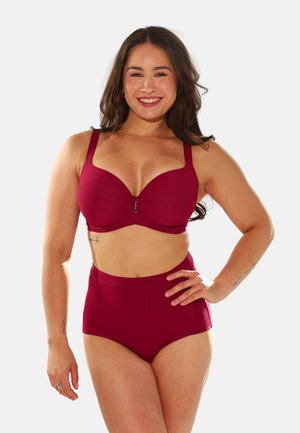 Burgundy undergarments featuring a smooth bra with molded cups and a high-waisted brief; minimal hardware and seamless design.