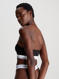 Calvin Klein Underwear LIGHTLY LINED BANDEAU ICON  - Modrček za pod majico - black