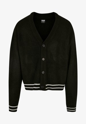 Mustardi mustriga kardigan V-kaelusega, millel on viis nuppu, valged triibud varrukatel ja allääres ning lühendatud disain.