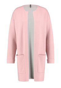 Vaaleanpunainen neuletakki pehmeästä materiaalista, jossa on rento istuvuus, avoin etu, kaksi etutaskua ja pitkät hihat taitetuilla hihoilla.