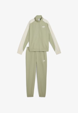 Dres w jasnooliwkowym kolorze z kurtką na zamek z kremowymi akcentami oraz pasującymi spodniami, wykonany z gładkiej, lekkiej tkaniny.