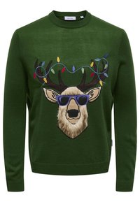 Groene gebreide trui met een rendier met hoorns, dat paarse zonnebril draagt, versierd met kleurrijke lichtjes en geborduurde details.