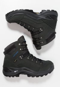Botas de senderismo negras con un upper de cuero duradero, paneles de malla texturizada, ojales de metal y suelas de goma resistentes para mayor tracción.