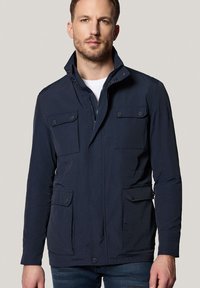 - Kurtka przejściowa