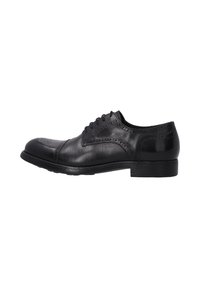 Zwarte leren dress-shoe met ronde neus, vetersluiting, brogue-details, een gladde textuur en een lage gestapelde hak.
