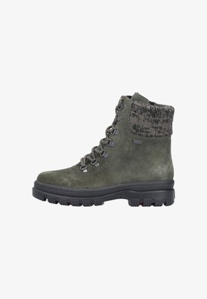 Green suede ankle boots with a knitted cuff, metal eyelets, and laces. Thick black outsole with patterned traction detail.