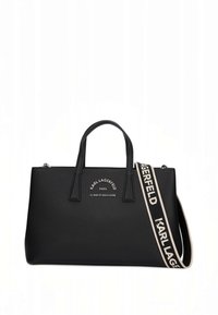 Svart strukturerad tygväska i texturerat läder med dubbla övre handtag och en avtagbar rem med logodetaljer.