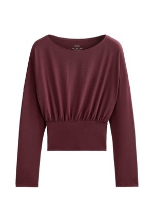 Bordeauxrode top met lange mouwen, een ronde halslijn, een geplooide taille en een cropped ontwerp. Gemaakt van zachte, elastische stof met een gladde textuur.