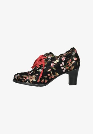 Schwarze Stoffschuhe mit floralen Stickereien in Rot, Pink und Grün. Sie haben eine abgerundete Zehenpartie, rote Ripsband-Schnürsenkel und einen mittelhohen schwarzen Absatz.
