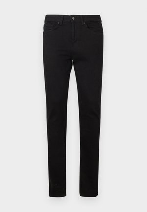 Melni džinsi no kokvilnas auduma, ar šauru piegriezumu, piecām kabatām, priekšā pogu aizdari un vieglu auduma izbalēšanu.