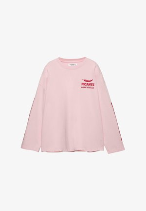 Lichtroze T-shirt met lange mouwen van katoen, met rode tekst "PICANTE" en een chili-illustratie op de voorkant en mouw.