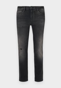 Jeans negri din denim slim-fit cu efect de decolorare, ușor uzate în zona genunchiului, cinci buzunare și închidere standard cu nasture și fermoar.