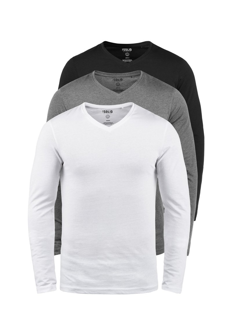 Garās piedurkņu T-krekli baltā, pelēkā un melnā krāsā. Katrs no tiem ir ar V veida kakla izgriezumu un izgatavots no mīksta, gluda auduma.