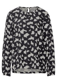 Blusa a maniche lunghe in bianco e nero con un motivo geometrico astratto. Tessuto leggero e morbido con una leggera lucentezza e scollatura rotonda.
