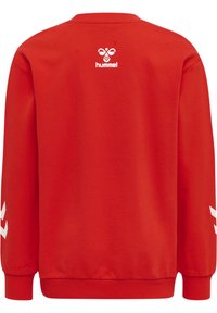 Sweat-shirt rouge à col rond, manches longues et poignets côtelés. Présente un logo "hummel" blanc au dos et un motif chevron blanc sur les manches.