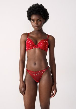 CONQUETE - Thong - red